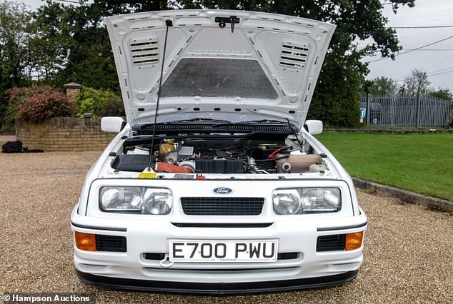 You'll need a fat wallet if you want this Fast Ford: Inclusive of buyer's fees, the winning bidder could pay close to £100,000 for the 1980's boy-racer's favourite