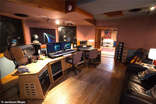 Making music: Mr Hopwood has a well-equipped studio at Hulgrave Hall