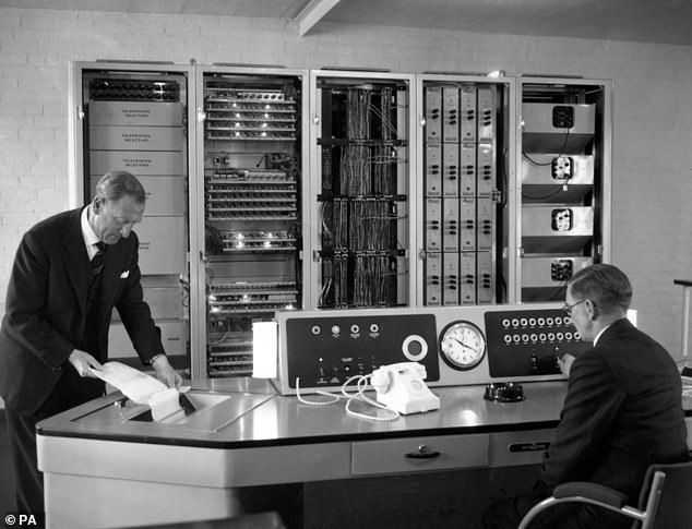End of an era: Prize cheques have been issued by NS&I to Premium Bonds winners since 1964, when the first version of Ernie the random number generator was still doing the draw