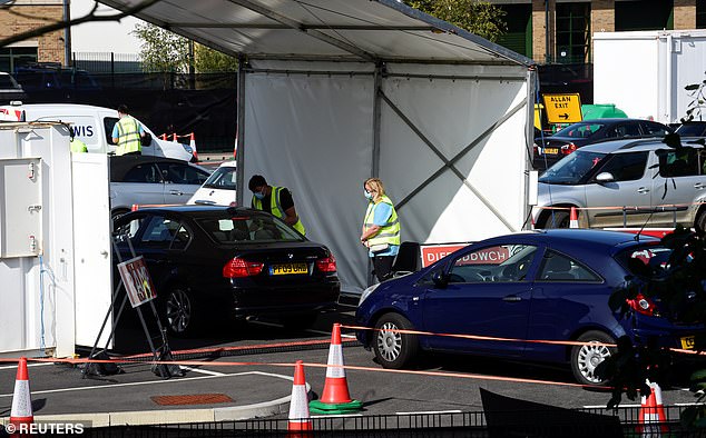 When the nightmare of this pandemic is halted by new medicines and vaccines there will be £2 trillion of national debt that will need to be eventually paid back over the decades. Pictured: Cars line up at a testing centre in Abercynon