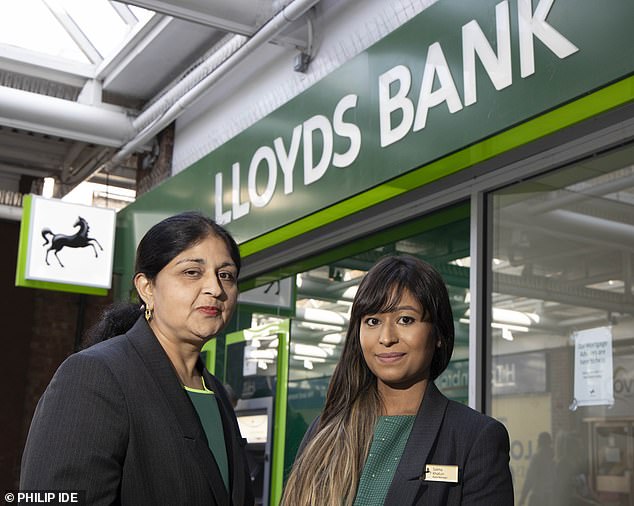 Bustling: Lloyds bank manager Salma Khatun (right) and her colleague Manjula Sood