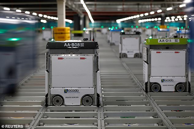 Ocado has been accused of stealing technology used in its robotic stock pickers (pictured) from a Norwegian rival