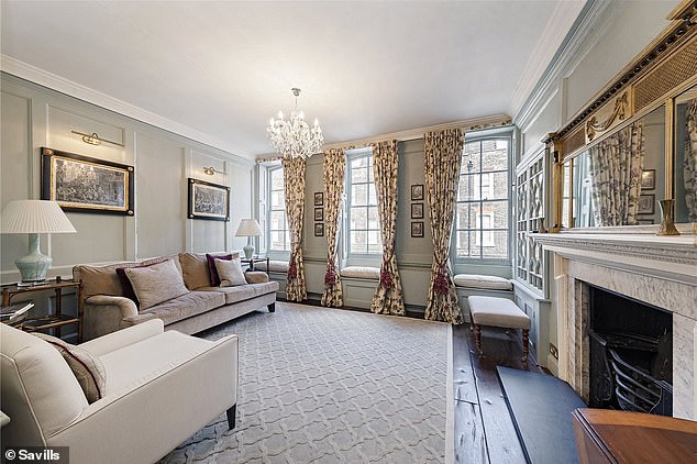 The house retains plenty of period features, including sash windows