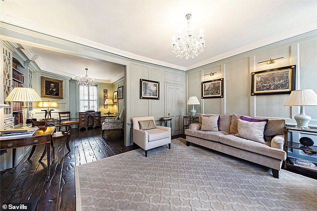 The house spreads across five floors, with a drawing room on the first floor