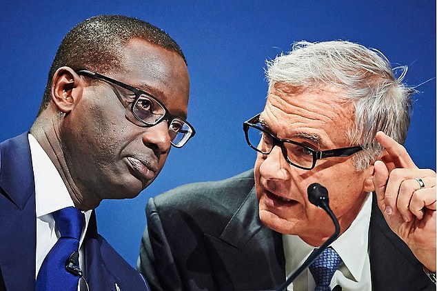 Credit Suisse’s then-boss Tidjane Thiam, left, walked out of chairman Urs Rohner's, right, 60th birthday party after a black performer dressed as a janitor to dance on stage