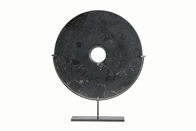 Not only for Halloween: This black marble disk accessory is from LuxDeco and costs £195