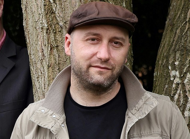 Struggling: Freelance photographer Paul Husband fears getting a huge tax bill in January