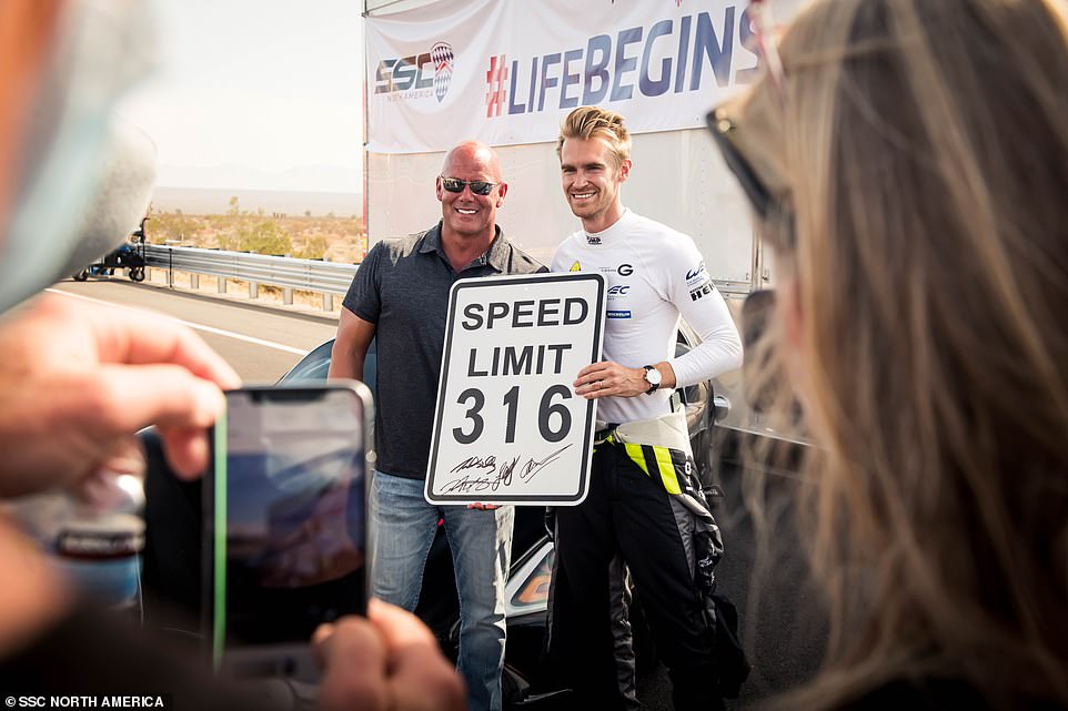 SSC founder and CEO Jerod Shelby (left) - no relation to famed US car designer Carroll Shelby - posing with British racing driver Oliver Webb (right), who was at the wheel for the high-speed run