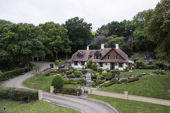 Worcestershire: The Spinney is a spacious four-bedroom home overlooking the River Avon near Pershore. There is a drawing room with a brick fireplace and wood-burning stove. Knightfrank.co.uk, 02045 028 066. £785,000