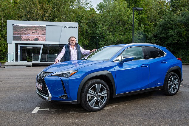 Test run: Ray poses with the new Lexus which can be ordered from November 1 for deliveries in March