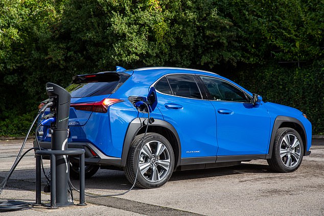Plug in: The Lexus has two charging ports - one for a domestic wall-box, the other for a fast DC version. Charging to 80 per cent takes 50 minutes on a rapid charger or eight hours at home